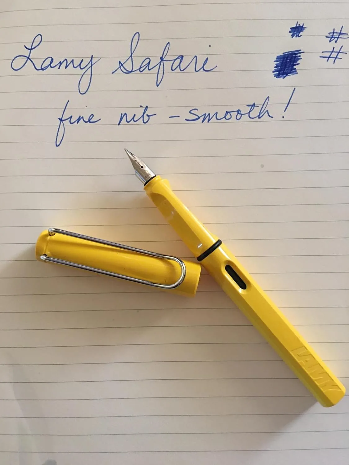 Customer photo of fountain pen writing sample on white paper showing ink flow and line quality