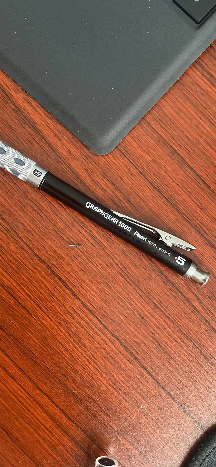 Customer photo showing lead size comparison between 0.3mm, 0.5mm, and 0.7mm mechanical pencil tips